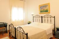 Posteľ alebo postele v izbe v ubytovaní Agriturismo La Genziana