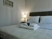 Posteľ alebo postele v izbe v ubytovaní Personal Holiday Homes