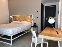 Posteľ alebo postele v izbe v ubytovaní Residence Hotel Moderno