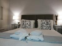 Posteľ alebo postele v izbe v ubytovaní Personal Holiday Homes