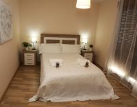Postel nebo postele na pokoji v ubytování Apartamento turisticos Puente Romano P3 1-B