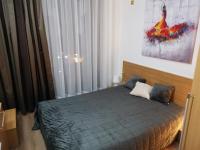Postel nebo postele na pokoji v ubytování Paradise Bay D8 Apartment