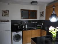 Kuchyň nebo kuchyňský kout v ubytování Paradise Bay D8 Apartment