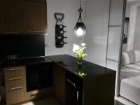 Kuchyň nebo kuchyňský kout v ubytování Paradise Bay D8 Apartment