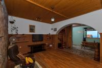 Televízia a/alebo spoločenská miestnosť v ubytovaní Holiday home Duje