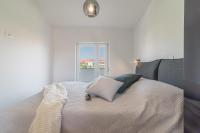 Posteľ alebo postele v izbe v ubytovaní Luxury Piano apartment