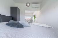 Posteľ alebo postele v izbe v ubytovaní Luxury Piano apartment