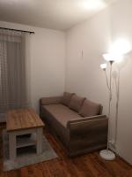 A seating area at Apartman s terasou