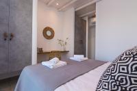 Postel nebo postele na pokoji v ubytování IL SOGNO VILLAS Paros