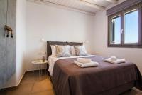 Postel nebo postele na pokoji v ubytování IL SOGNO VILLAS Paros