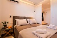 Postel nebo postele na pokoji v ubytování IL SOGNO VILLAS Paros