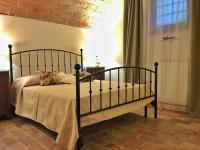 Posteľ alebo postele v izbe v ubytovaní Le Camere Del Borgo