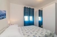 Postel nebo postele na pokoji v ubytování Yole apartman