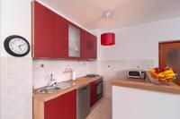Kuchyň nebo kuchyňský kout v ubytování Yole apartman