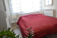 Posteľ alebo postele v izbe v ubytovaní City Corso Apartman