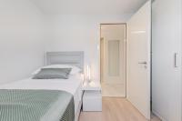 Postel nebo postele na pokoji v ubytování Spacious Family Apartment MM
