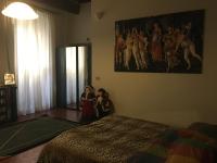 A bed or beds in a room at Al Borgo