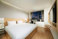 Fraser Place Namdaemun Seoulにあるベッド