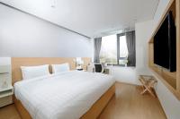 Fraser Place Namdaemun Seoulにあるベッド
