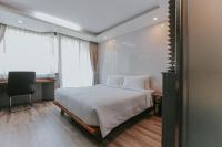 Postel nebo postele na pokoji v ubytování Bangkok City Link Hotel