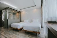 Postel nebo postele na pokoji v ubytování Bangkok City Link Hotel