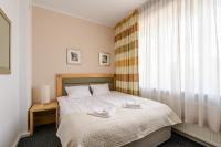 Posteľ alebo postele v izbe v ubytovaní 404 Rooms Wilanowska