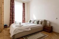 Posteľ alebo postele v izbe v ubytovaní St. Stephen Boulevard Apartment