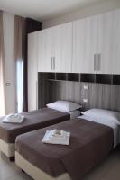 Posteľ alebo postele v izbe v ubytovaní Time Out ApartHotel