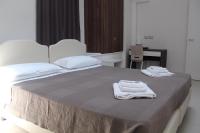 Posteľ alebo postele v izbe v ubytovaní Time Out ApartHotel