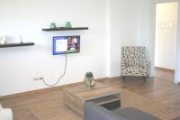 Televízia a/alebo spoločenská miestnosť v ubytovaní CASA LUCIA
