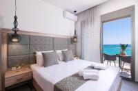 Posteľ alebo postele v izbe v ubytovaní Stelakis Beach