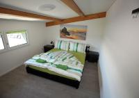 Ein Bett oder Betten in einem Zimmer der Unterkunft BeachIN - Sport, Events, Hotel, Restaurant, Bar