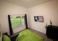 Ein Bett oder Betten in einem Zimmer der Unterkunft BeachIN - Sport, Events, Hotel, Restaurant, Bar