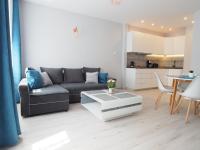Kuchyňa alebo kuchynka v ubytovaní Grand-Tourist Amber Rose Apartment