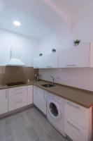 Kuchyň nebo kuchyňský kout v ubytování COQUETO APARTAMENTO EN EL CENTRO DE CADIZ