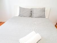 Posteľ alebo postele v izbe v ubytovaní Pension Aussie Guesthouse