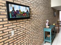 Madre Naturaにあるテレビまたはエンターテインメントセンター