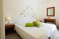 Posteľ alebo postele v izbe v ubytovaní Kimata Apartments
