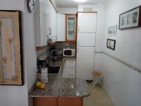 A kitchen or kitchenette at Apartamento A Peregrina (Silgar, Sanxenxo)