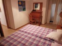 A bed or beds in a room at Apartamento A Peregrina (Silgar, Sanxenxo)