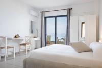 Posteľ alebo postele v izbe v ubytovaní Kimata Apartments