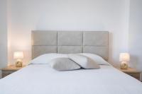 Posteľ alebo postele v izbe v ubytovaní Kimata Apartments