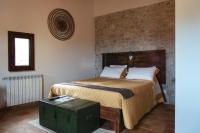 A bed or beds in a room at Aurora Medieval House