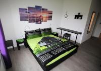 Ein Bett oder Betten in einem Zimmer der Unterkunft BeachIN - Sport, Events, Hotel, Restaurant, Bar
