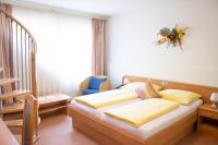 Posteľ alebo postele v izbe v ubytovaní Hotel Burgstallerhof