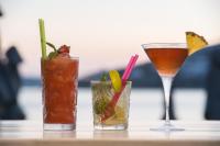 dos cócteles sentados en una mesa con una bebida en Agia Anna Beachfront Boutique, en Paraga