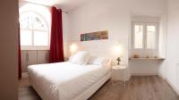 A bed or beds in a room at TALA FLAT