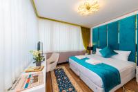 Postel nebo postele na pokoji v ubytování Eastanbul Suites