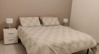 A bed or beds in a room at Appartamento a due passi dal mare