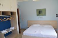 Posteľ alebo postele v izbe v ubytovaní Dimitropoulos Apartments